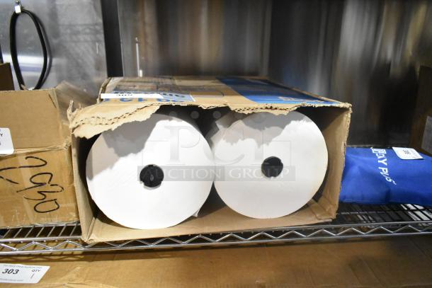 Box of 2 Tork Basic Paper Wiper Rolls, brand new, in scratched box. Rolls are intact and unused.