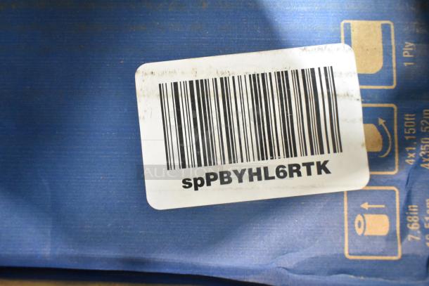 Box of 2 Tork Basic Paper Wiper Rolls, brand new, with scratch and dent. Barcode visible: spPBYHL6RTK.