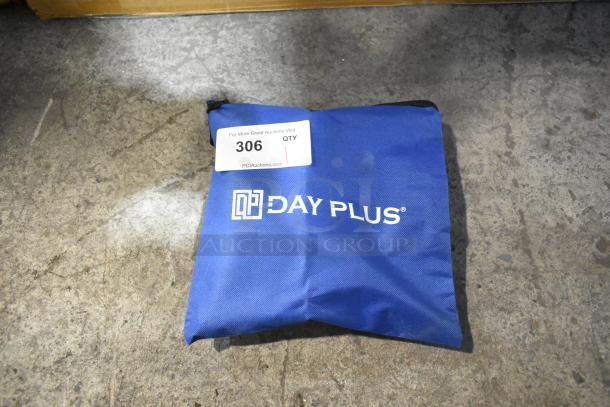 DayPlus drill in blue soft bag, labeled with "For More Great Auctions Visit PCIAuctions.com, 306 QTY."