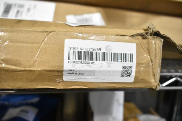 Cardboard box with label showing model G1925-14138275859, faucet, made in China. Box slightly dented.