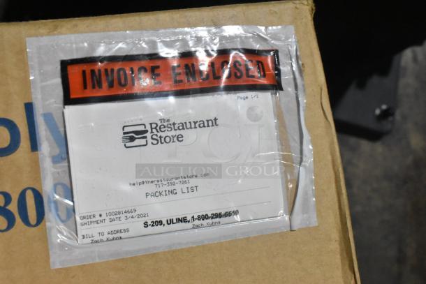 Cardboard box with "Invoice Enclosed" label from The Restaurant Store, containing Ashland PolyTrap 4804 grease trap.