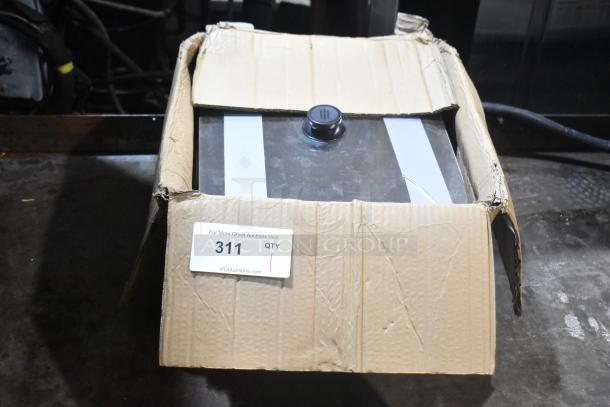 BRAND NEW SCRATCH AND DENT metal bin in damaged box, displayed partially open, with auction label reading “311 QTY 1.”