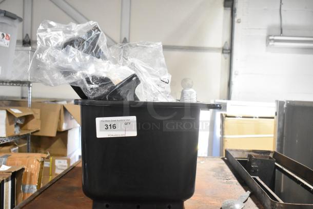 Black poly bin with various contents, labeled "316 QTY" for auction. New condition, scratch, and dent noted.
