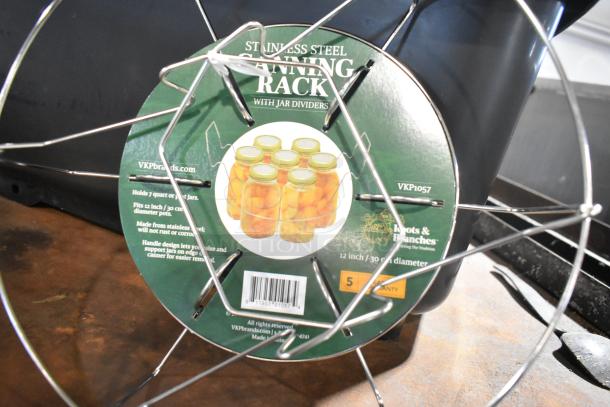 BRAND NEW SCRATCH AND DENT black poly bin containing stainless steel canning rack with jar dividers; VKP1057 model.