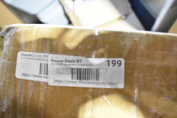 Cardboard box labeled "Insane Deals NY," with barcode and auction details. Box is slightly dented.