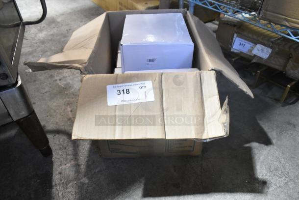 Box of G1925-G63-DSJXCXKS faucet, brand new with scratch and dent, partially open with contents visible, labeled "318".