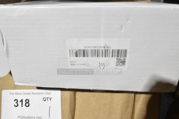Box of G1925-G63-DSJXCXKS Faucet, new with scratch and dent. Label reads "Faucet Made in China." Auction lot 318.