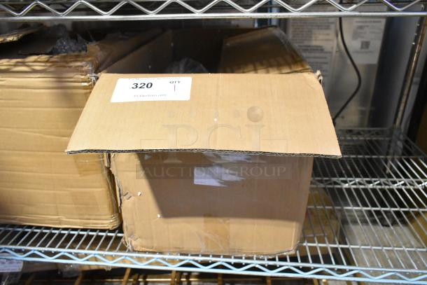 Cardboard box labeled "320 QTY 1" from PCIAuctions.com. Box appears slightly damaged with open flaps.