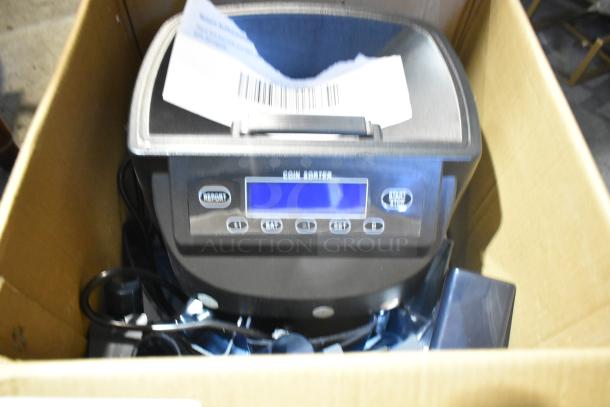 BRAND NEW XD-9005 Electronic Coin Sorter in box. Scratch and dent condition. 110 Volts, 1 Phase.