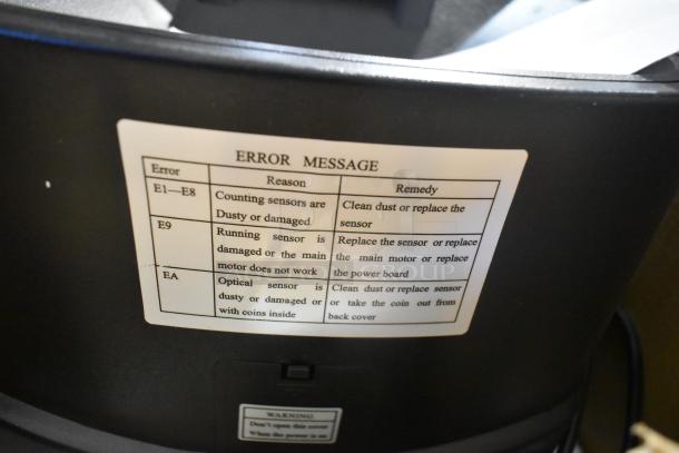 BRAND NEW XD-9005 Electronic Coin Sorter with scratch and dent. Features 110 Volts, 1 Phase. Error message label visible.