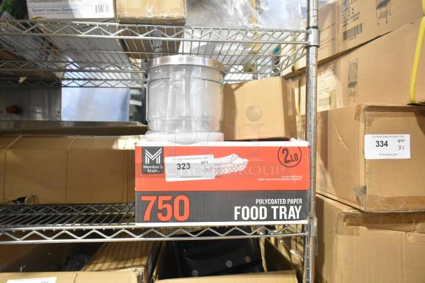 Brand new Member's Mark food trays box on shelf, marked as quantity 750, alongside a clear cylindrical jar on top.
