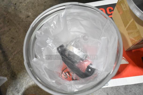 Brand new items in packaging: food trays, wooden barrel decoration, and jar. Slight scratches and dents visible.