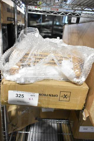 Two new items packaged in bubble wrap with visible box labeled "325 QTY X2". Scratch and dent condition.