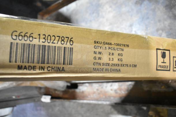 Cardboard box labeled G666-13027876, marked "Made in China," with dimensions 29x9.5x75.5 cm, fragile icon visible.