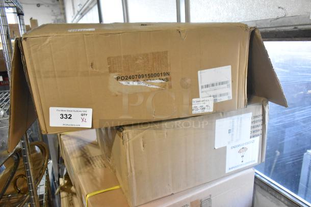 Cardboard boxes containing brand new, scratch and dent items: fan lamp and Tiffany style light, marked for auction, quantity XL.