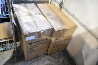 Two sealed cardboard boxes labeled "19 IN Wood Top Plant Stand," marked "Scratch and Dent," new condition, PO# 55161694.