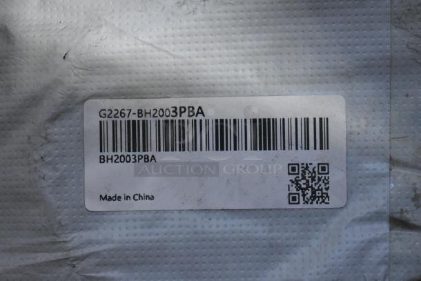 Label showing barcode and text "G2267-BH2003PBA" for black striped bathroom pieces. Made in China.