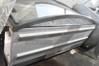 Metal Commercial Freezer Merchandiser on Commercial Casters. - Item #1217413