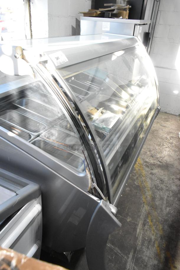 Sevel Metal Commercial Gelato Case Merchandiser with stainless steel drop-in bins, features curved glass front, in used condition.