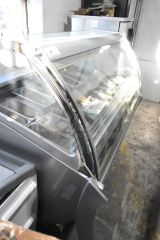 Sevel Metal Commercial Gelato Case Merchandiser with stainless steel drop-in bins, features curved glass front, in used condition.