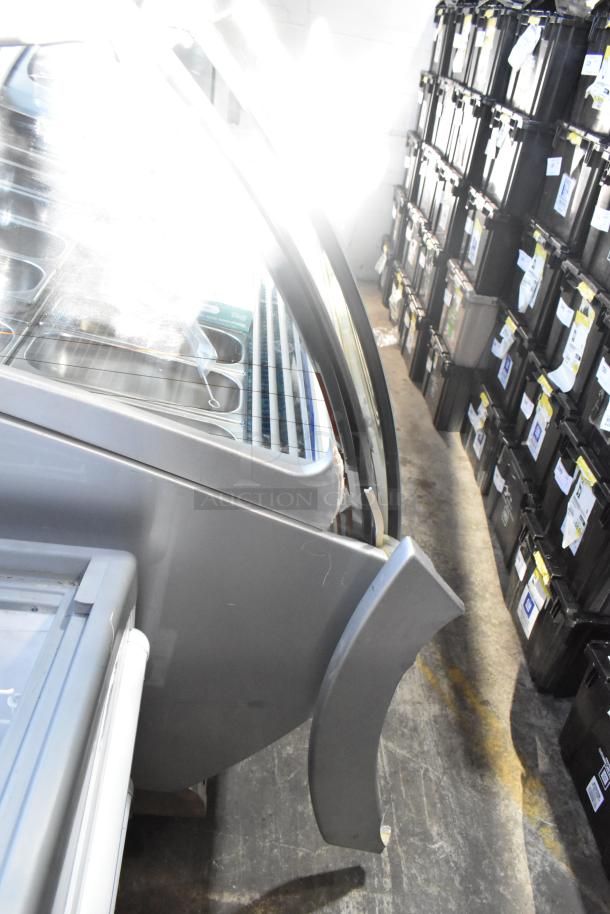 Sevel metal commercial gelato case merchandiser with stainless steel drop-in bins, good condition, visible wear.