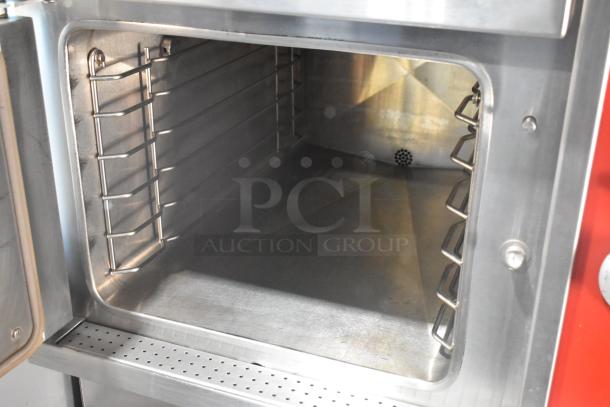 Vulcan VSX24G stainless steel steam cabinet interior, commercial-grade, natural gas, 2 deck capacity, 200,000 BTU, clean condition.
