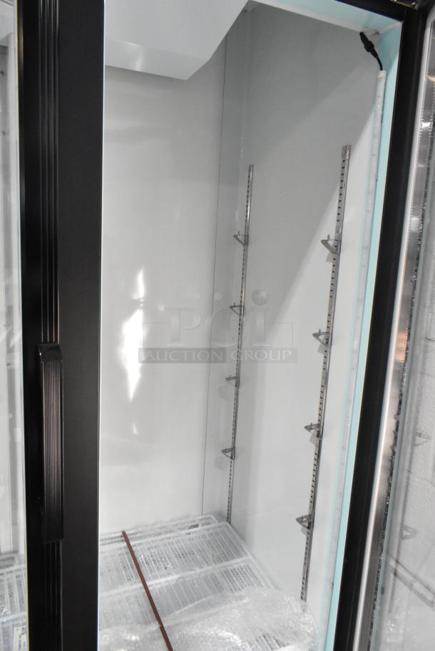 Avantco 178GDC40HCB commercial cooler, metal, 2 doors, poly coated racks, commercial casters, visible broken glass.