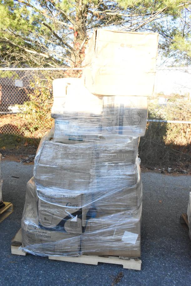 Pallet of 25 new scratch and dent items, including cold cups and takeout containers, wrapped in plastic outdoors.