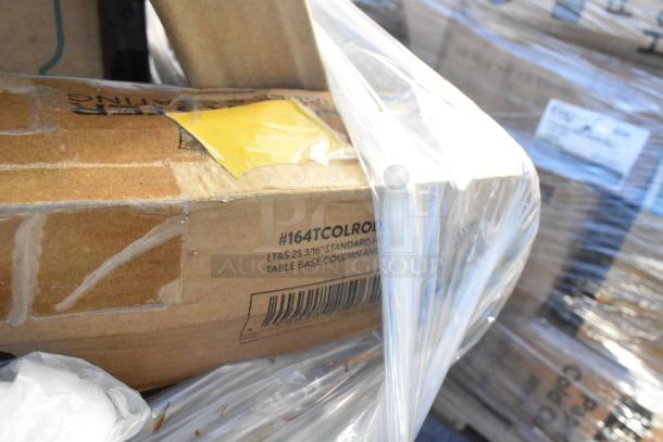 Cardboard boxes wrapped in plastic containing new scratch and dent items, visible label reads "#164TCOLORADO," indicating contents.