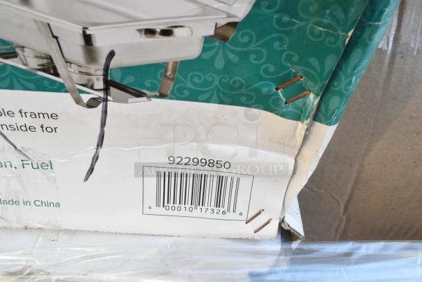 Cardboard box with visible barcode and partial image of a stainless steel chafer, indicating new catering items.