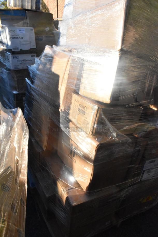 Pallet with 24 scratch and dent items, wrapped in plastic. Includes glasses, ingredient bins, plates. Boxes labeled with item types.
