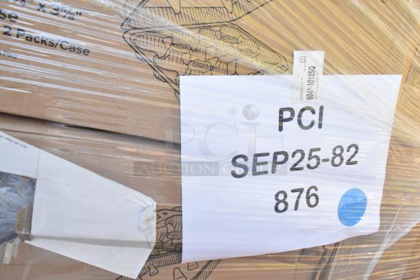 Stacked boxes of brand new scratch and dent items, including napkins and containers, pallet wrapped and labeled "PCI SEP25-82 876".
