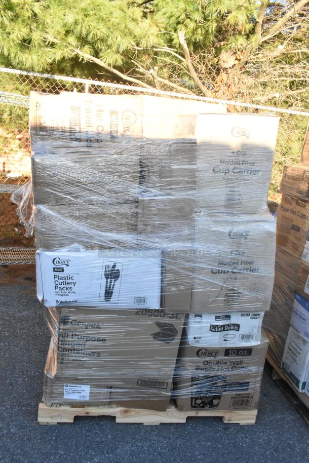 Pallet of assorted new items including cup carriers, cake circles, salad bowls, and plastic plates, boxed and wrapped.