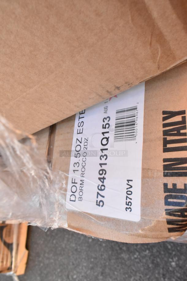 Cardboard boxes labeled "DOF 13.5oz Bormioli Rocco." Items include glasses, steam pans, containers. New scratch and dent.