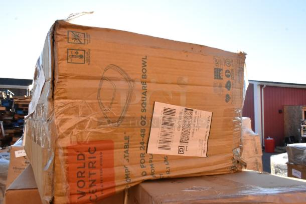 Damaged box labeled "World Centric," containing 24-48 oz square bowls, part of a lot of new scratch and dent items.
