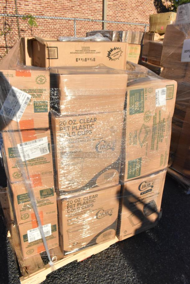 Pallet of boxed items including lids, containers, food trays. Labels indicate "20 oz clear PET plastic cold cups" by Choice. Brand new, scratch and dent condition.