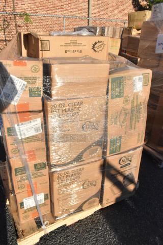Pallet of boxed items including lids, containers, food trays. Labels indicate "20 oz clear PET plastic cold cups" by Choice. Brand new, scratch and dent condition.