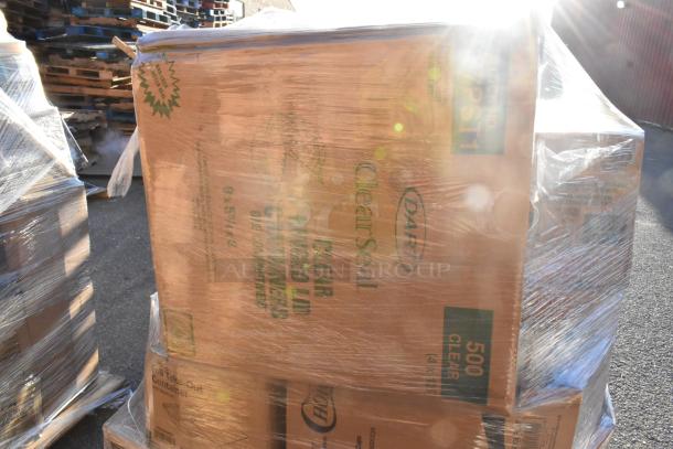 Shrink-wrapped pallet of Dart ClearSeal food containers, labeled 500 clear, new condition with minor scratches and dents.