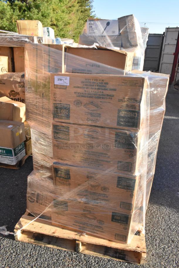 Pallet of 21 brand new scratch and dent items, including lids, containers, and food trays, wrapped in clear plastic.