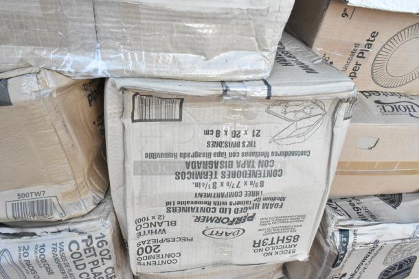 Brand new scratch and dent lot of 23 items including dispensers and paper plates. Boxes show visible wear.