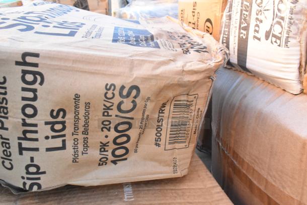 Brown packaging of plastic sip-through lids, 50 packs of 20 per case, 1000 per case, labeled #500LSTRWL, showing some wear.