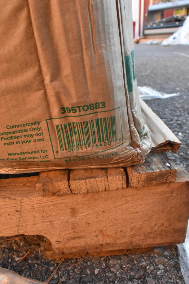 Box of scratch and dent items, including salad bowls and hot cups. Label shows barcode, made-in-China, compostable.