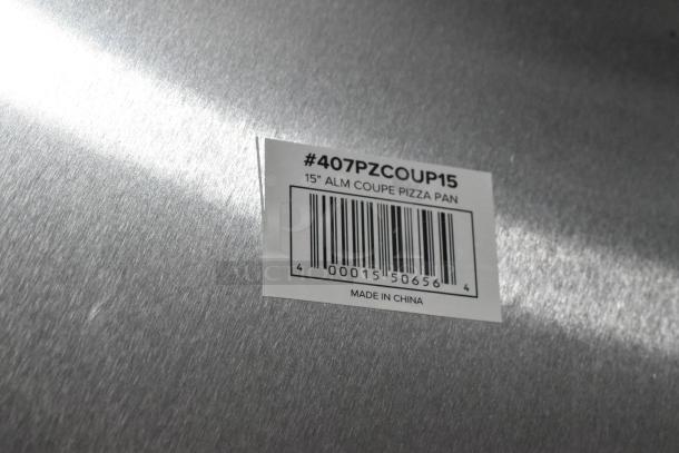20 new 15" metal baking sheets, model 407PZCOUP15, scratch and dent condition. Label indicates made in China.