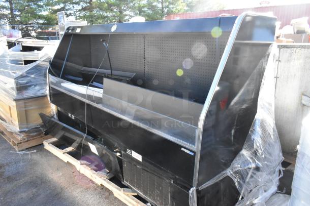 2016 Hill Phoenix C000072997CF8 metal commercial merchandiser, 1 phase, 120V, black, used condition, on pallet.