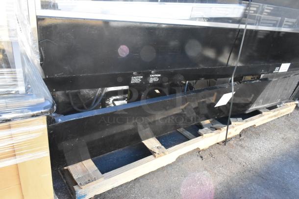 2016 Hill Phoenix C000072997CF8 metal commercial merchandiser, 120 volts, 1 phase, on a pallet. Visible caution labels.