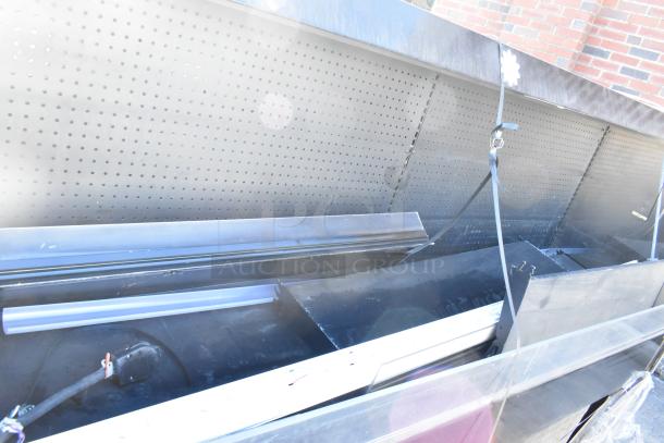 2016 Hill Phoenix C000072997CF8 metal commercial merchandiser, 120V, 1 phase, showcasing interior shelving and lighting.