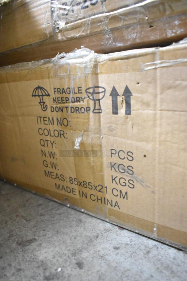 Box with handling symbols marked "Fragile, Keep Dry, Don't Drop." Measures 85x85x21 cm, made in China. Appears new.