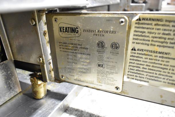Giles GVH-C ventless hood system with electrostatic cleaner and two fryers. Stainless steel, 208-240V, 1 phase. Keating label shown.