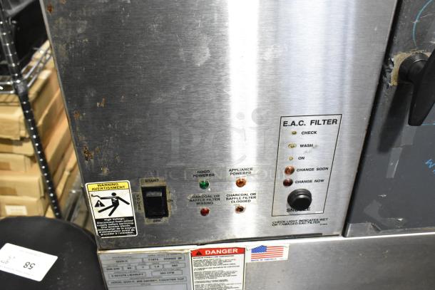 Giles GVH-C stainless steel ventless hood system with electrostatic air cleaner. Includes control panel and warning labels.