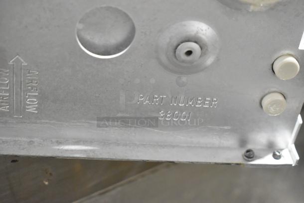 Giles GVH-C stainless steel ventless hood system detail showing part number 38001 and airflow indicators.